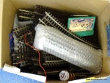 BOX LOT OF ASSORTED METAL O-SCALE TRAIN TRACK. ITEM IS SOLD AS IS WHERE IS WITH NO WARRANTY OR