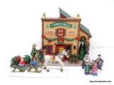 HOLIDAY VILLAGE BUILDING OF A CHRISTMAS GARDEN SHOP WITH ADDITIONAL FIGURINES TO INCLUDE A HORSE