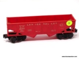 O GAUGE LIONEL TRAINS LEHIGH VALLEY HOPPER CAR NO. 6476. MEASURES 9 IN LONG. ITEM IS SOLD AS IS