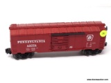 O GAUGE LIONEL PENNSYLVANIA 19751 BOXCAR. MEASURES 9.75 IN LONG. ITEM IS SOLD AS IS WHERE IS WITH NO