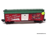 LIONEL TRAINS 2008 O GAUGE HOLIDAY BOXCAR. MEASURES 10 IN LONG. ITEM IS SOLD AS IS WHERE IS WITH NO