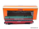 LIONEL NORTH POLE CENTRAL COACH CAR #6-25183 WITH BOX. MEASURES 11 IN LONG. ITEM IS SOLD AS IS WHERE