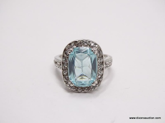 .925 STERLING SILVER LADIES BLUE TOPAZ RING. SIZE 8.
