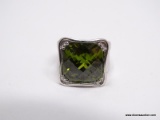 .925 STERLING SILVER LADIES 20 CT PERIDOT RING SIZE 5 1/2; WEIGHS 13.1 GM