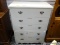 (R1) 5 DRAWER CHEST WITH BRASS CHIPPENDALE PULLS. MEASURES 32 IN X 17 IN X 41 IN. ITEM IS SOLD AS IS