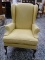 (R2) YELLOW UPHOLSTERED MAHOGANY QUEEN ANNE WING BACK CHAIR. IS 1 OF A PAIR. MEASURES 32 IN X 32 IN