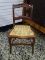 (R2) MAHOGANY CANE BOTTOM SIDE CHAIR. MEASURES 17 IN X 18 IN X 32 IN. ITEM IS SOLD AS IS WHERE IS