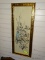 (R2) FRAMED ORIENTAL STYLE FLORAL PRINT IN A GOLD TONE BAMBOO STYLE FRAME. MEASURES 14 IN X 33 IN.