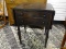 (R2) 2 DRAWER DROP LEAF END / SIDE TABLE. MEASURES 24 IN X 19 IN X 30 IN. TOP MAY NEED TLC. ITEM IS