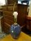 (R2) BLUE GLAZED CERAMIC TABLE LAMP WITH HARP. MEASURES 19.5 IN TALL. ITEM IS SOLD AS IS, WHERE IS,