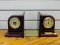 (R2) PAIR OF MAHOGANY BOOKENDS (1 HAS A CLOCK AND 1 HAS A BAROMETER). ITEM IS SOLD AS IS, WHERE IS,