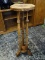 (R2) MAPLE 3 SPINDLE BASE PLANT STAND. HAS AGING (ALSO HAS SOME SEPARATION ON THE TOP). MEASURES 35