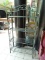 (R2) METAL BAKERS RACK WITH 4 SHELVES AND LEAF PATTERN ACCENTS. MEASURES 36 IN X 15 IN X 71 IN. ITEM