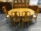 (R1) SOLID OAK DINING SET TO INCLUDE A SOLID OAK QUEEN ANNE DINING TABLE WITH TWO 20 IN LEAVES AND 6