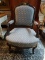 (R1) MAHOGANY AND BLUE UPHOLSTERED ARM CHAIR WITH UPHOLSTERED SEAT, BACK, AND ARMS. HAS A GOLD