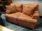 (R1) HICKORY HOUSE FURNITURE CO. FLORAL AND ANIMAL UPHOLSTERED LOVESEAT. MEASURES 64 IN X 42 IN X 38