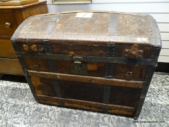 (R1) ANTIQUE DOME TOP TRUNK WITH WOOD AND METAL HARDWARE. MEASURES 32 IN X 20 IN X 26 IN. 1 SIDE