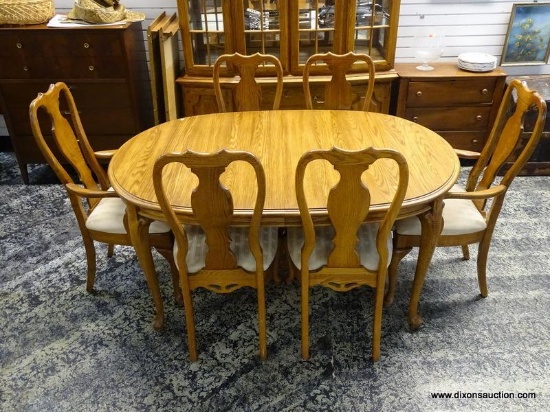 (R1) SOLID OAK DINING SET TO INCLUDE A SOLID OAK QUEEN ANNE DINING TABLE WITH TWO 20 IN LEAVES AND 6