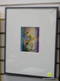 (R1) FRAMED STILL LIFE PRINT WITH WHITE MATTING. IS IN A SILVER TONE FRAME AND MEASURES 11 IN X 14