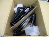 (R1) BOX FULL OF BLACK PLASTIC AND METAL HANGERS. ITEM IS SOLD AS IS WHERE IS WITH NO GUARANTEES OR