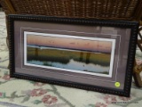 (R2) FRAMED MARSH PRINT WITH BIRDS FLYING OVERHEAD AT SUNSET. IS IN A BLACK BEADED FRAME AND