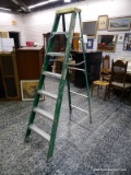 (R2) GREEN DAVIDSON 7 FT TALL LADDER. ITEM IS SOLD AS IS WHERE IS WITH NO GUARANTEES OR WARRANTY. NO