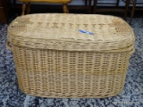 (R2) LARGE OBLONG WICKER CLOTHES / LAUNDRY BASKET. MEASURES 32 IN X 21 IN X 13 IN. ITEM IS SOLD AS