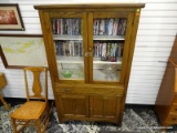 (R2) ANTIQUE OAK CUPBOARD WITH 2 UPPER GLASS DOORS, 1 CENTER DRAWER, AND 2 LOWER DOORS. MEASURES