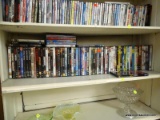 (R2) SHELF LOT OF DVD'S TO INCLUDE SPEED, OVER THE HEDGE, CARS, THE PINK PANTHER, STAR WARS EPISODES