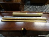 (R2) MAILING TUBE CONTAINING YARD STICKS, AND 2 METAL STABILIZING BARS. ITEM IS SOLD AS IS WHERE IS