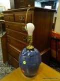 (R2) BLUE GLAZED CERAMIC TABLE LAMP WITH HARP. MEASURES 19.5 IN TALL. ITEM IS SOLD AS IS, WHERE IS,