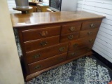 (R2) ETHAN ALLEN 10 DRAWER DRESSER WITH BRASS CHIPPENDALE STYLE PULLS. MEASURES 56 IN X 21 IN X 35