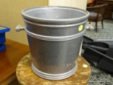 (R2) PEWTER ICE BUCKET WITH 2 HANDLES. MEASURES 10 IN X 9 IN. ITEM IS SOLD AS IS, WHERE IS, WITH NO