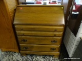 (R2) OAK FALL FRONT DESK WITH INTERIOR CUBBY STORAGE AND 3 LOWER DRAWERS. MEASURES 32 IN X 17 IN X