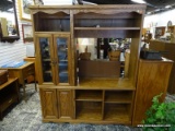 (R2) SOLID OAK ENTERTAINMENT CENTER WITH 2 SIDE GLASS DOORS, 2 LOWER WOOD PANELED SIDE DOORS, A