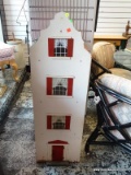 (R2) WHITE AND RED STRIPED 4 STORY DOLLHOUSE. MEASURES 14 IN X 12 IN X 44 1/2 IN. HAS SOME WEAR.