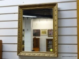 (R1) GOLD TONE FRAMED MIRROR. MEASURES 13 IN X 19 IN. ITEM IS SOLD AS IS WHERE IS WITH NO GURANTEES