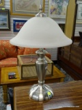 (R1) SILVER TONE AND FROSTED GLASS SHADE DOUBLE LIGHT LAMP WITH SILVER TONE FINIAL. MEASURES 20 IN
