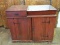 (SHOP OFFICE) PINE PAINTED RED DRY SINK- 45 IN X 4 IN X 37 IN. ITEM IS SOLD AS IS WHERE IS WITH NO