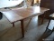 (SHOP) OAK TABLE WITH 2 LEAVES- WITH LEAVES IN- 76 IN X 36 IN X 30 IN. ITEM IS SOLD AS IS WHERE IS