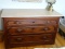 (UPBED 2) VICTORIAN WALNUT 3 DRAWER DRESSER WITH MUSTACHE PULLS AND A BEIGE MARBLE TOP. MEASURES 51
