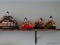 (UPBED 2) LOT OF 4 JAPANESE STYLE DOLLS. 3 ARE WOMEN AND 1 IS OF A MAN WITH A SWORD SITTING ON A