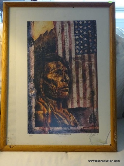 (LR) FRAMED NATIVE AMERICAN STYLE PRINT TITLED "WHEN COLORS BLEED". IS IN AN OAK FRAME AND MEASURES