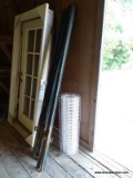 (BUILDING 1) 8 METAL T- POSTS AND PARTIAL ROLL OF 3 FT. HIGH NETTY WIRE. ITEM IS SOLD AS IS WHERE IS