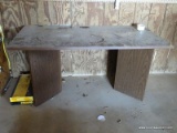 (SHOP) FAUX WOOD TABLE- 60 IN X 30 IN X 29 IN. ITEM IS SOLD AS IS WHERE IS WITH NO GUARANTEES OR