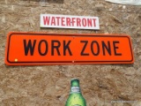 (SHOP) WORK ZONE SIGN- 48 IN X 12 IN. NEED WRENCH TO REMOVE. ITEM IS SOLD AS IS WHERE IS WITH NO