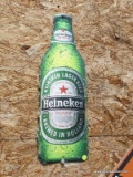 (SHOP) METAL HEINEKEN SIGN- 8 IN X 23 IN. ITEM IS SOLD AS IS WHERE IS WITH NO GUARANTEES OR