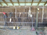 (SHED 2 ) ALL THE TOOLS ALONG THE WALL, INCLUDES METAL SHELVING UNIT. ITEM IS SOLD AS IS WHERE IS