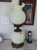 (MBR) OFF-WHITE OPAQUE GLASS PARLOR LAMP WITH FLORAL PATTERN AND BRASS ACCENTS & BASE. MEASURES 23