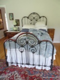 (MBR) CAST IRON FULL SIZE BED FRAME WITH CAST IRON RAILS. ITEM IS SOLD AS IS WHERE IS WITH NO